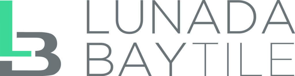 A gray and white logo for the town of sunny bay.